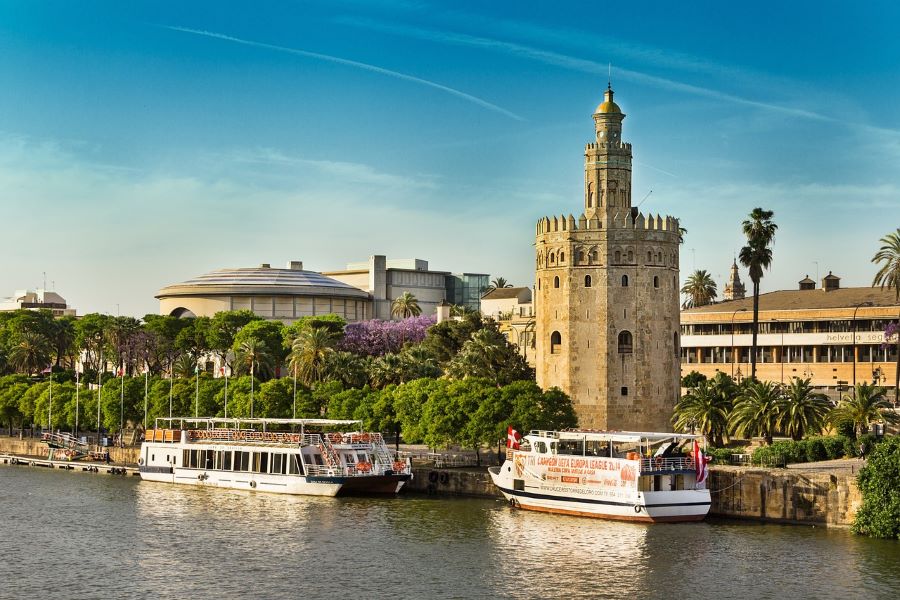 Visit the riverfront areas around the Guadalquivir River