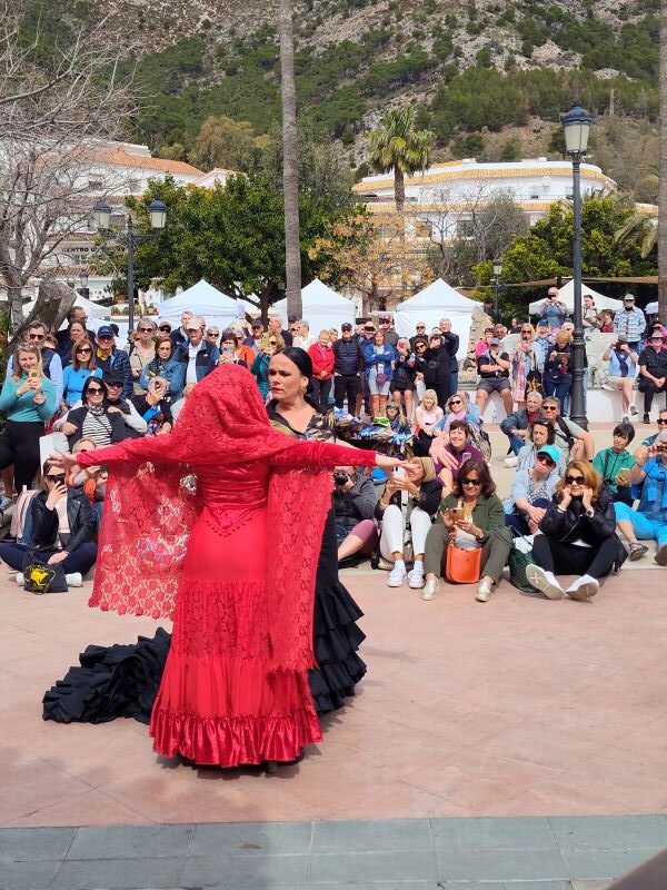 Watch the free Flamenco show at the bandstand