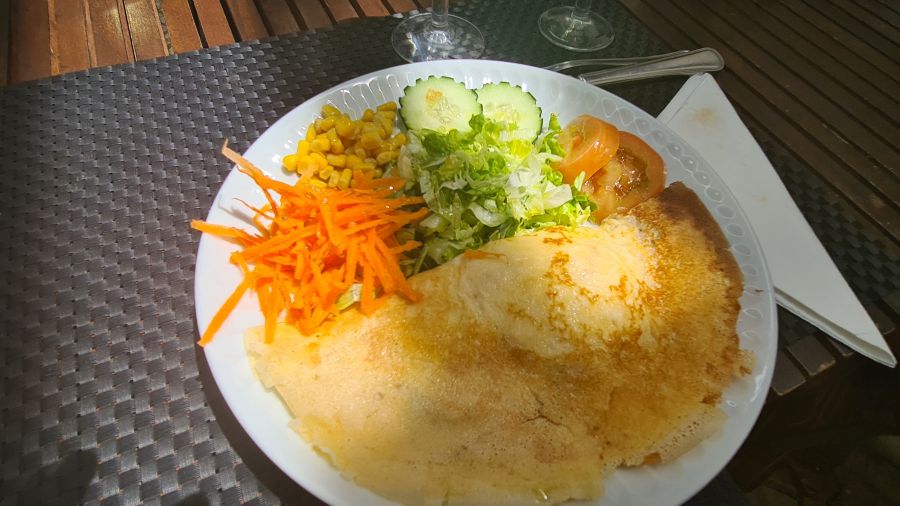 Good question. Here’s a description of the **dining venue** at the **Museu Nacional do Azulejo** (National Tile Museum) in Lisbon, based on information from their site and other sources: --- ### Dining Venue at the National Tile Museum (Museu Nacional do Azulejo) 1. **Cafeteria / Café** * The museum has a **cafeteria** (“Cafetaria”) that offers a broad range of gastronomic specialties. ([Museu Azulejo][1]) * The interior of the café is beautifully decorated with **19th-century azulejos (tiles)**, originally from a palace kitchen in Lisbon. ([Museu Azulejo][2]) * There is also a **terrace** in what is called the “Winter Garden” (Jardim de Inverno), providing a more open, garden-like space for dining or relaxing. ([Museu Azulejo][1]) * The café space (and other areas like the Winter Garden and Cloister of D. João III) can be **rented for private or corporate events**, which makes the dining venue quite versatile and historic. ([Museu Azulejo][2]) 2. **Restaurant** * In addition to the café, there’s a **restaurant** set in the old convent kitchens of the former Convento da Madre de Deus (“Mother of God Convent”). ([All About Portugal][3]) * The walls are tiled — quite fitting for a tile museum — using azulejos that originally came from a historic smokehouse kitchen in Lisbon. ([All About Portugal][3]) * The restaurant is fairly modest in size: according to their event rental info, the restaurant room holds **about 120 m²**. * There’s also a **garden area** (the Winter Garden) and the cloister, which can be used for dining or events. * In terms of cuisine, it is described as **traditional Portuguese**, in a “historic, but informal” atmosphere. ([All About Portugal][4]) * According to Tripadvisor, the restaurant/café is a good place for lunch or coffee, with reasonable prices, and has both indoor seating and outdoor tables. ([Tripadvisor][5]) * Specific dishes mentioned in some reviews or guides include Portuguese staples like **bacalhau (cod)** dishes, pork, crepes, and desserts like bolo de bolacha or nut-based sweets. ([lifecooler.com][6]) * The average reported price is around **€15**. ([lifecooler.com][6]) 3. **Ambience & Atmosphere** * The café and restaurant spaces are **very atmospheric**: tiled walls, historical architecture from the old convent, and a peaceful garden-terrace makes it a pleasant place to rest in between gallery visits. ([lifecooler.com][6]) * The Winter Garden adds a sense of calm and history, giving guests a break in a green, light-filled area. ([Museu Azulejo][1]) * According to travel guides, the café is “pretty” and features food-themed tiles (e.g. fish, grapes) that show off the museum’s tile heritage. ([The Geographical Cure][7]) 4. **Practical Info** * Location: Rua da Madre de Deus, 4, 1900-312 Lisbon. ([lifecooler.com][6]) * Opening hours for the café / restaurant roughly align with the museum’s hours (the café is open when the museum is, though "CLOSED" is marked in some event-rental contexts — check the museum’s official site for up-to-date hours). ([Museu Azulejo][2]) * Accessibility: Reviews mention that the restaurant is **wheelchair accessible**. ([Tripadvisor][8]) * The venue offers both **indoor and outdoor seating** (terrace), making it flexible for different preferences. ([lifecooler.com][6]) * For events: The restaurant area, Winter Garden, and cloister are rentable, making the space possible for private dinners or corporate functions. --- **Summary / Impression**: The dining venue at the National Tile Museum is more than just a café — it’s a historically rich, architecturally beautiful space that complements the museum’s tile-centered theme. Whether you’re grabbing a light snack in the winter garden or enjoying a more substantial Portuguese lunch in the tiled restaurant, it’s a place where the cultural and culinary experiences blend nicely. --- If you like, I can pull up the **current menu (2025)** for the museum restaurant—do you want me to check? [1]: https://www.museunacionaldoazulejo.pt/cafetaria?utm_source=chatgpt.com "CAFETARIA | Museu Azulejo" [2]: https://www.museunacionaldoazulejo.pt/en/cafetaria?utm_source=chatgpt.com "CAFETARIA | Museu Azulejo" [3]: https://www.allaboutportugal.pt/en/lisboa/restaurants/restaurante-do-museu-nacional-do-azulejo?utm_source=chatgpt.com "Restaurante do Museu Nacional do Azulejo | Restaurant, Lisboa | All About Portugal" [4]: https://www.allaboutportugal.pt/pt/lisboa/restaurantes/restaurante-do-museu-nacional-do-azulejo?utm_source=chatgpt.com "Restaurante do Museu Nacional do Azulejo | Restaurante, Lisboa | All About Portugal" [5]: https://www.tripadvisor.com.br/Restaurant_Review-g189158-d1940830-Reviews-Ristorante_Caffetteria_Museu_Nacional_do_Azulejo-Lisbon_Lisbon_District_Central_P.html?utm_source=chatgpt.com "RISTORANTE CAFFETTERIA MUSEU NACIONAL DO AZULEJO, Lisboa - Comentários de Restaurantes, Fotos & Número de Telefone" [6]: https://lifecooler.com/artigo/comer/restaurante-do-museu-nacional-do-azulejo/428206/?utm_source=chatgpt.com "Restaurante do Museu Nacional do Azulejo" [7]: https://www.thegeographicalcure.com/post/lisbon-s-azulejo-museum?utm_source=chatgpt.com "Lisbon’s Azulejo Museum: A Tile Lover’s Must-See - The Geographical Cure" [8]: https://www.tripadvisor.pt/Restaurant_Review-g189158-d1940830-Reviews-Ristorante_Caffetteria_Museu_Nacional_do_Azulejo-Lisbon_Lisbon_District_Central_P.html?utm_source=chatgpt.com "RISTORANTE CAFFETTERIA MUSEU NACIONAL DO AZULEJO, Lisboa - Comentários de Restaurantes, Fotos & Número de Telefone" 